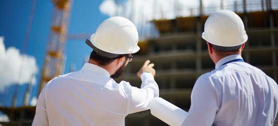 Two men planning a rural development project