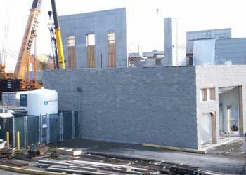 New facilities begin to take shape as walls are added to a new facility