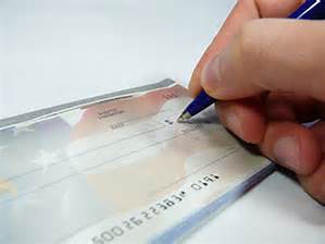 th9ALAYXZ8 A person writes a check