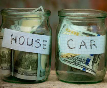 Two jars of cash labled house and car