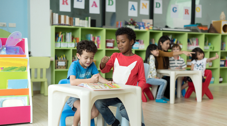 Children in a classroom with learning materials