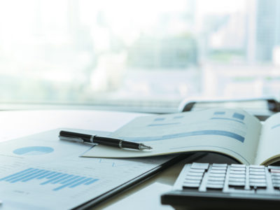 Data Analysis. Pen with business report on financial advisor desk. Concept of business planning , accounting, business analysis,financial planning services.