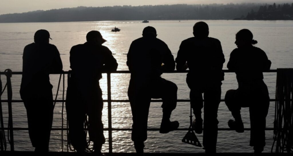 Picture of people standing on naval vessel