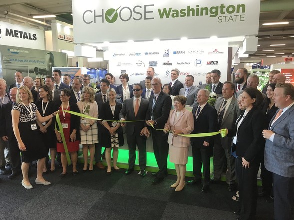 Lisa Brown cutting ribbon at PAS19
