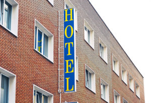 Hotel sign on side of building