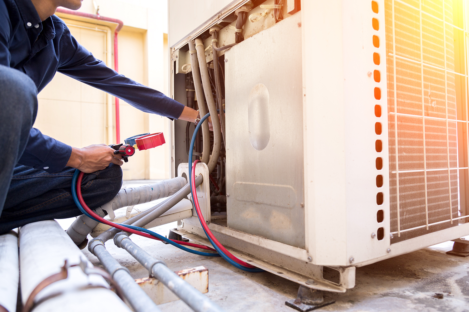 HVAC Worker doing maintenance