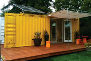 Photo of a model housing unit that reuses a shipping container