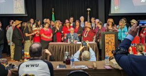 Governor Inslee signing bills with Tribal leaders