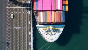 Aerial photo of a colorful container ship in port at Seattle WA