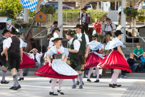 Photo of folk dancing in the streets during Leavenworth Bavarian festival