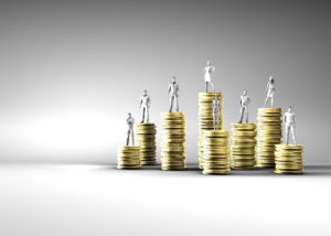 Figures standing on stacks of coins